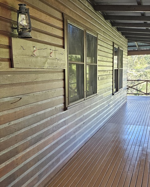 A weatherboard home exterior prepped for painting