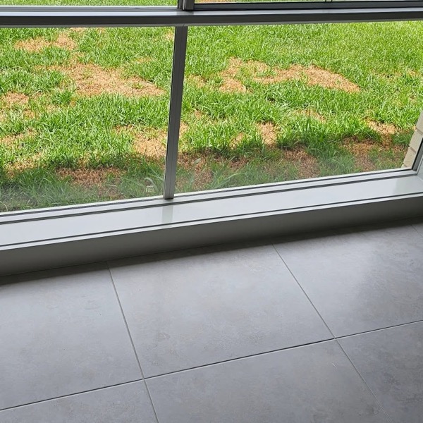Freshly painted window sills and exterior trim