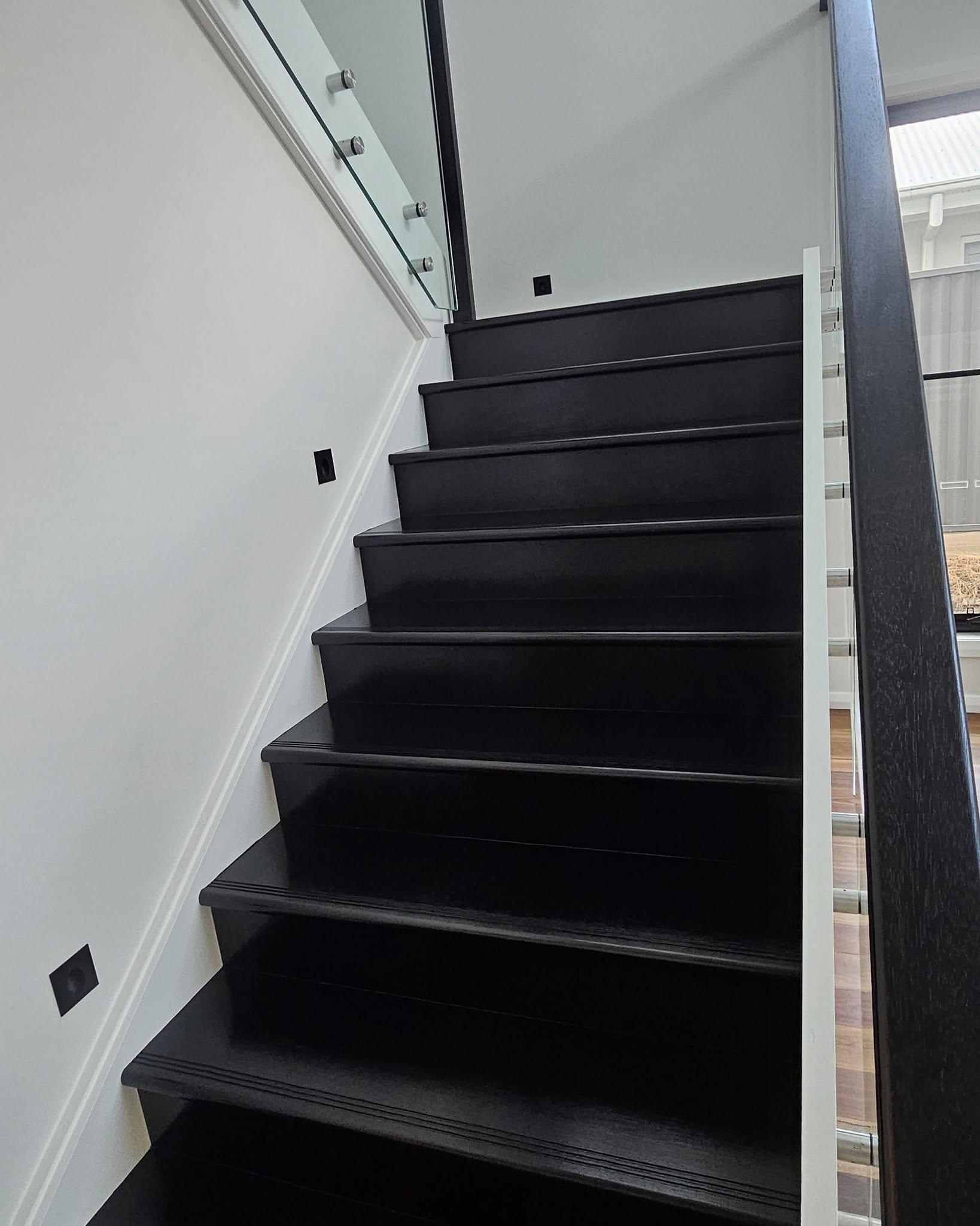 A freshly painted interior staircase