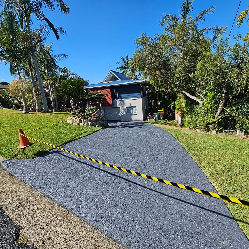 A coated driveway and home exterior